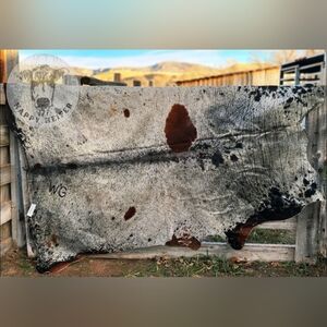 Stunning Brazilian Shiny Gray,  Black and Brown Splatter cowhide rug.